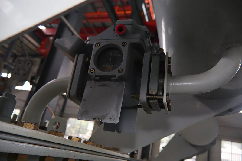 Magnetic oil level gauge on transformer conservator