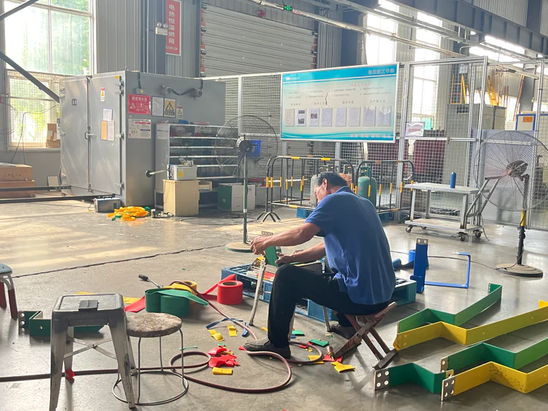 Technicians performing transformer final assembly