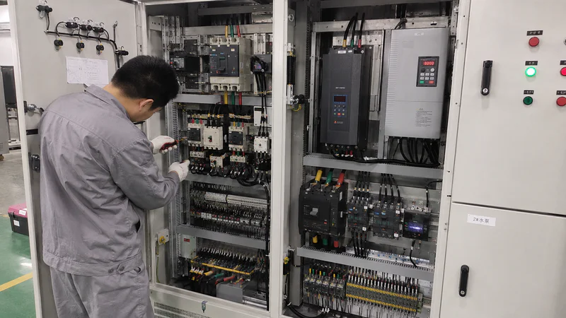Contactors and motor starters inside an MCC panel
