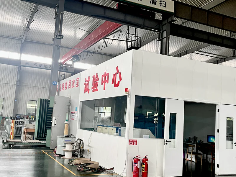 Engineer running factory acceptance tests on transformer and switchgear equipment